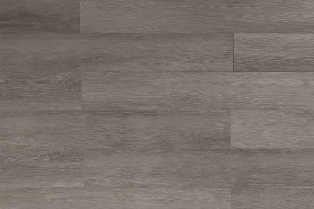 Mink SPC vinyl flooring, top view of the staggered plank pattern.