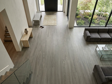 Cathedral SPC vinyl flooring, shown across an entryway and living room.