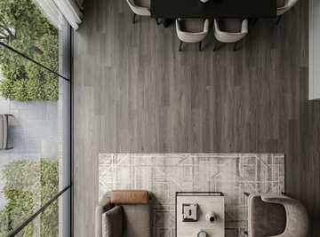 Congo SPC vinyl flooring, overhead view between a dining table and seating area.