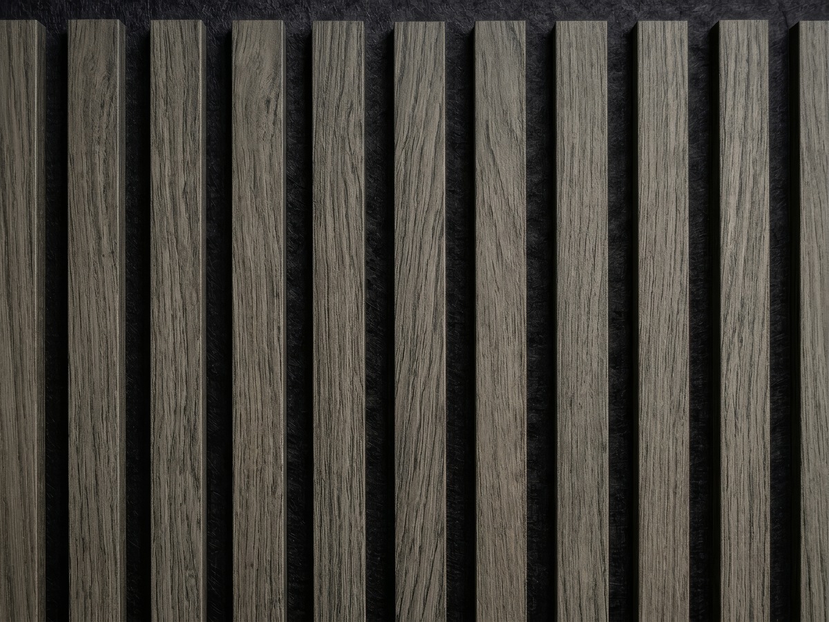 Cloud Grey wood slat acoustic panels, close-up of the grain and dark gaps between slats.